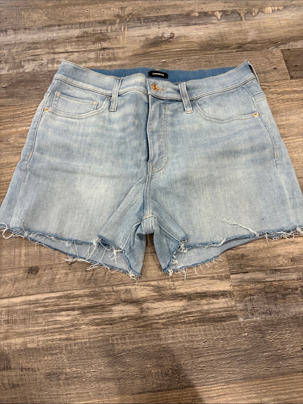 Express Light Wash Cutoff Denim Shorts in Pale Blue